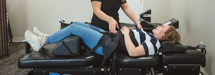 A patient receiving spinal decompression