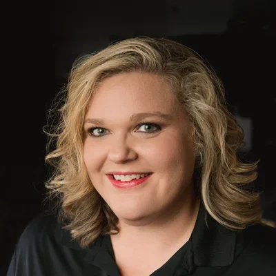 A headshot photo of Erica, the office manager at GreenLife Wellness