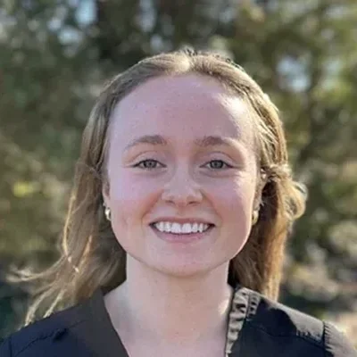 A headshot photo of Marrissa, a front desk employee at GreenLife Wellness