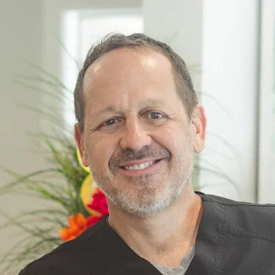 A headshot photo of Dr. Bill Barnes, a chiropractor at GreenLife Wellness